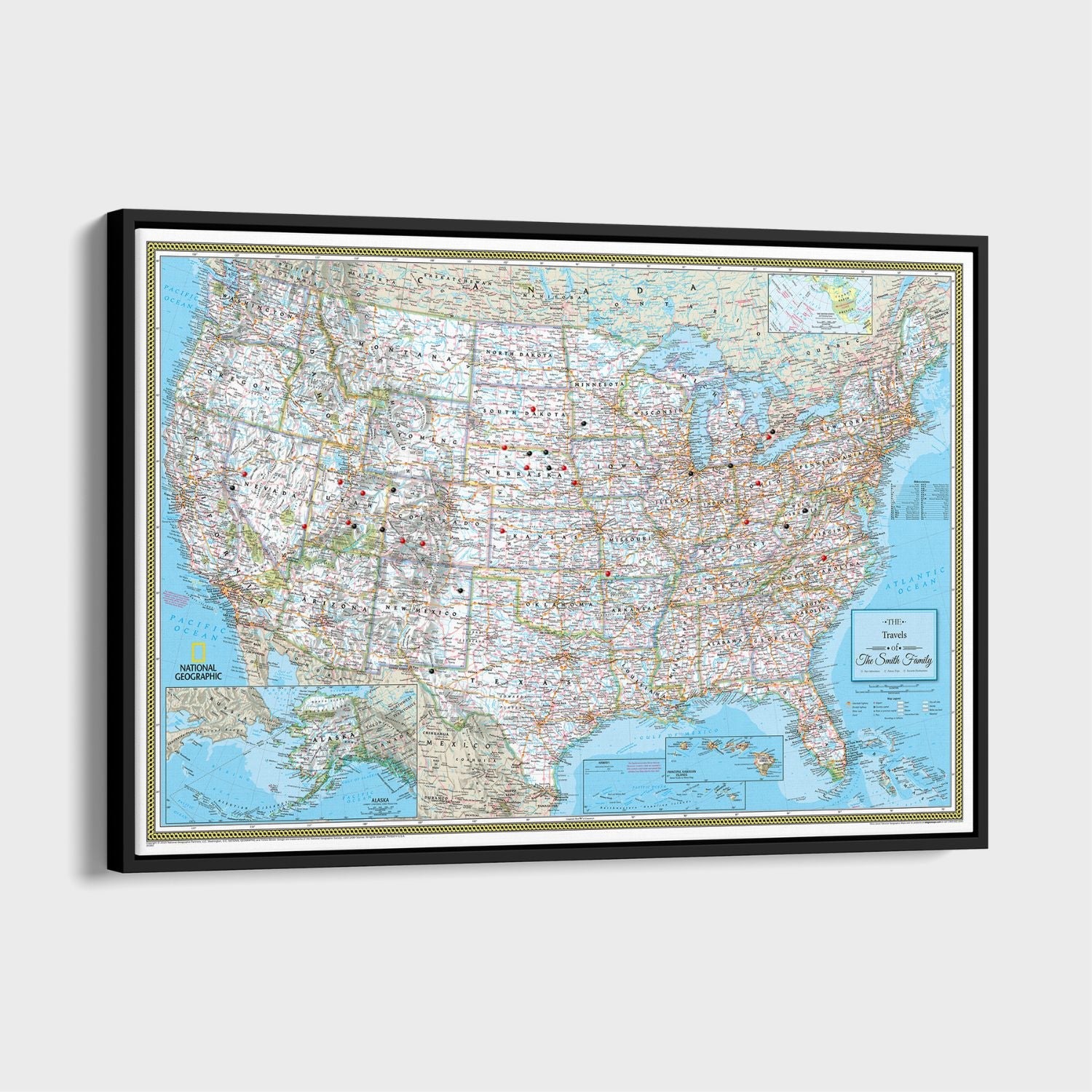 Personalized National Geographic Classic USA travel pin map on black-framed canvas with colorful topographical detail