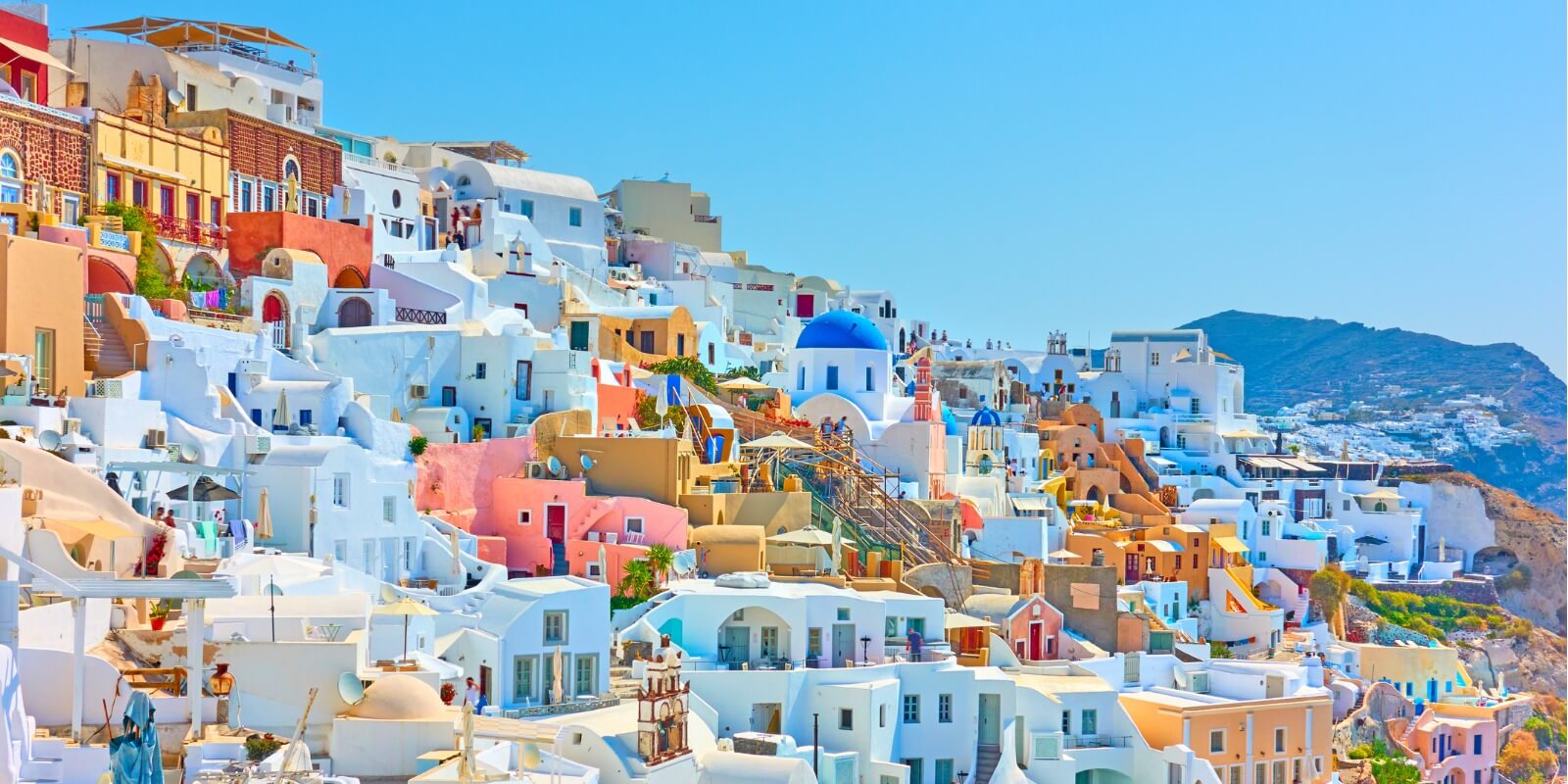 Colorful panorama of Oia town in Santorini, Greece