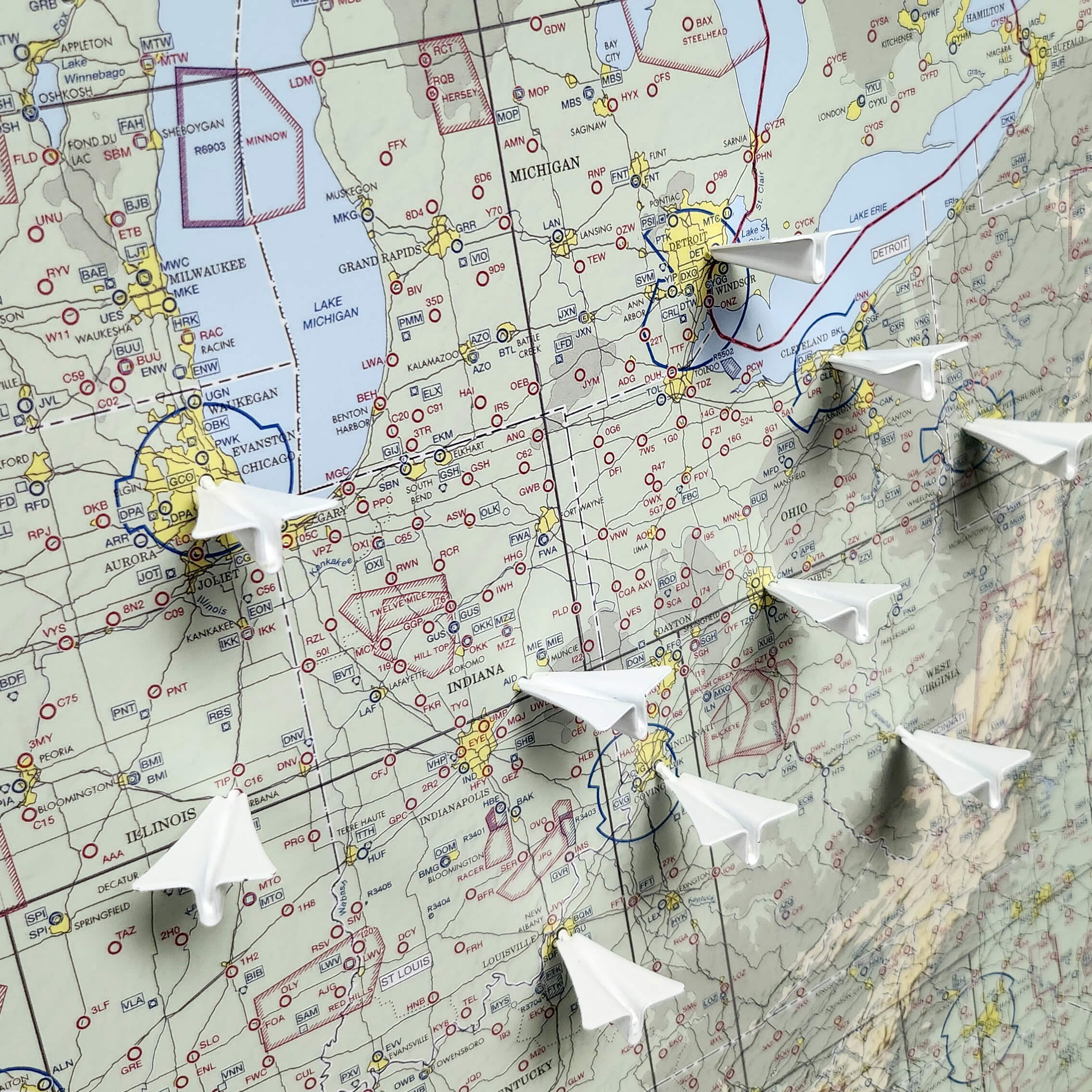 White Metal Paper Plane Push Pins shown on VFR Pilots USA Wall Map