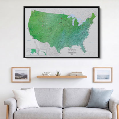 Enchanting Emerald watercolor USA travel map canvas with pins displayed above living room sofa