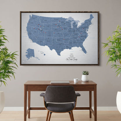 Personalized blue ice USA push pin travel map canvas hung above modern wood desk in home office