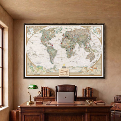 Framed canvas executive world travel map in Brown frame with red and black pins hung above desk