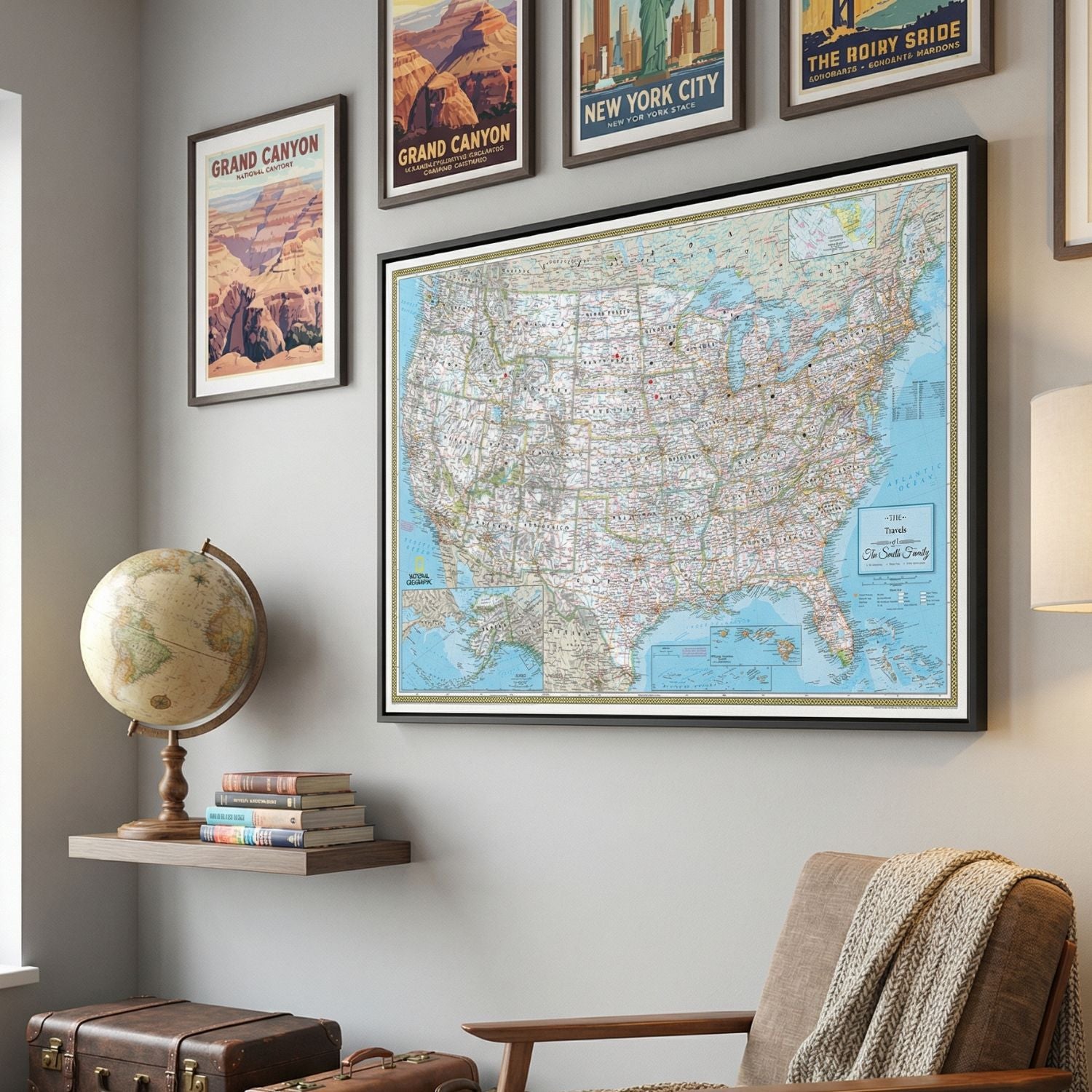 Framed Classic USA National Geographic canvas travel pin map displayed on gray living room wall with vintage travel posters and globe