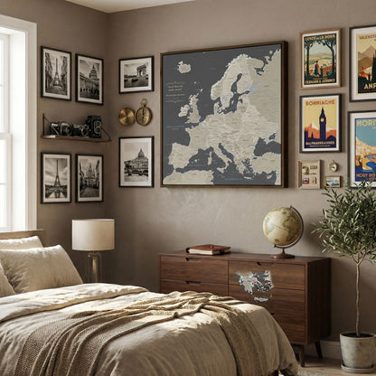 Earth toned Europe travel map canvas with pins displayed above wooden dresser in cozy travel-themed bedroom