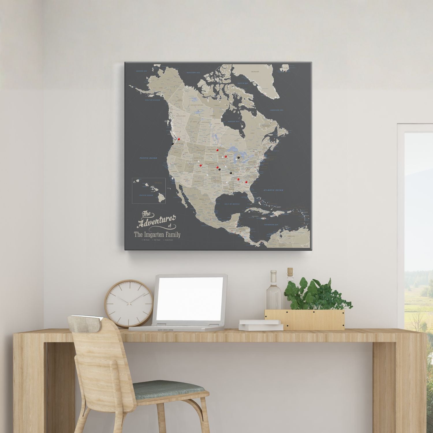 Personalized earth toned North America travel map with push pins displayed above a modern desk