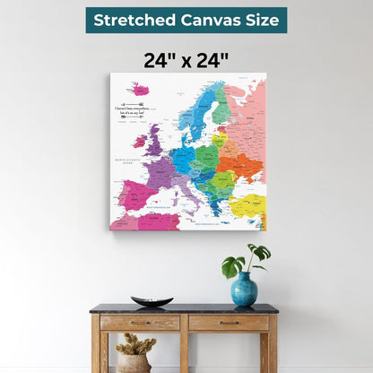 Colorful Europe travel map canvas 24x24 inches displayed above wooden console table