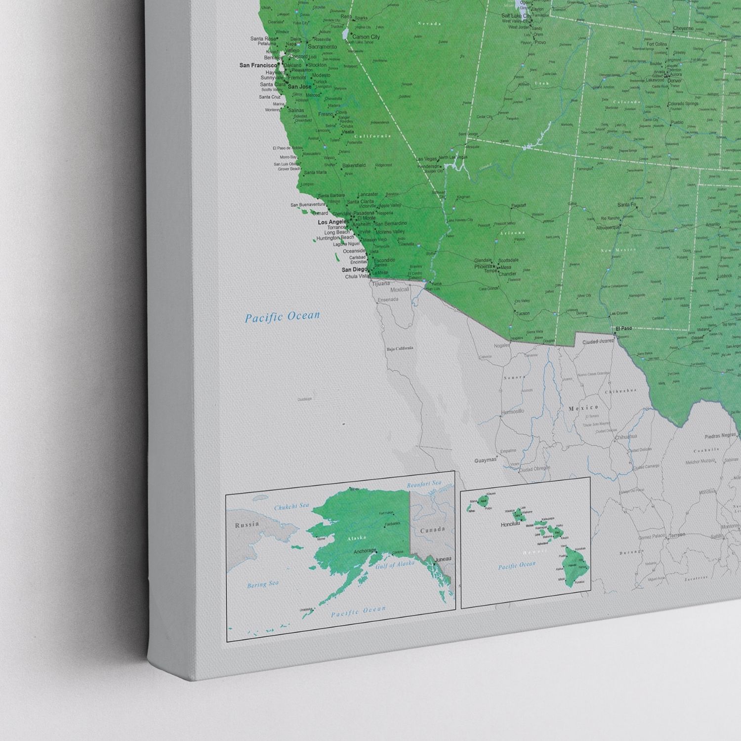 Close-up corner angle of emerald green watercolor USA canvas travel map showing California Pacific Coast and Alaska inset