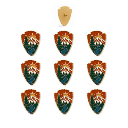 Set of 9 national park arrowhead enamel push pins featuring mountain, pine trees, and river scene