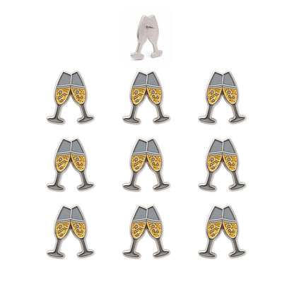 Set of nine champagne toast enamel push pins with gold glitter and silver nickel finish, back view shown top center