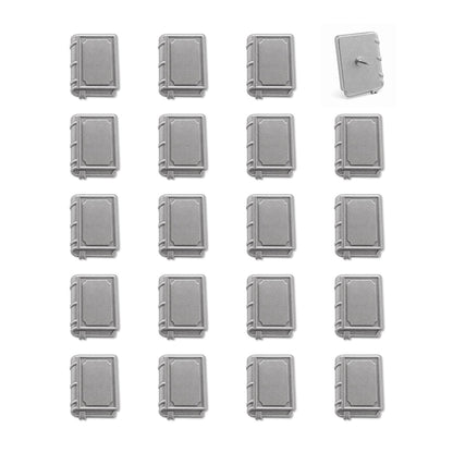 Set of 20 silver metal book-shaped push pins with embossed covers and spine details, one shown with pin backing visible