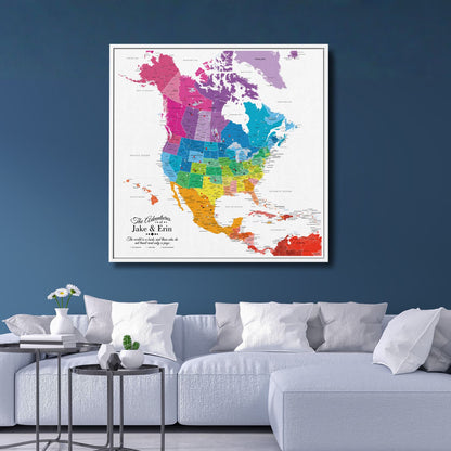 Colorful North America travel map canvas with pins hanging above modern living room sofa